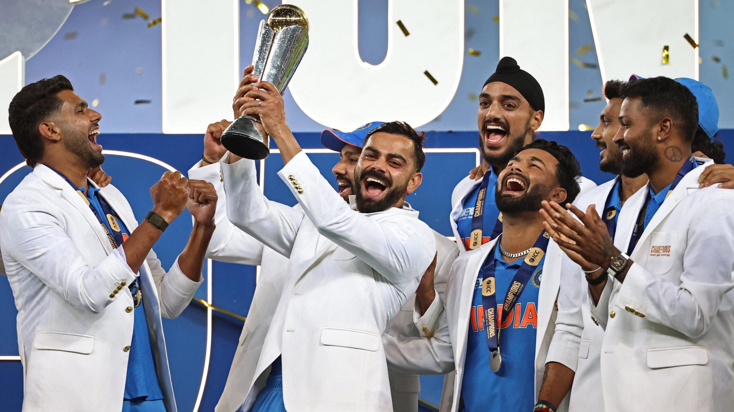 indian team wear Champion trophy winning coat with Pakistan written on it